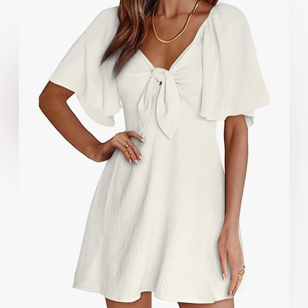 Elegant White Dress with Bow Detail